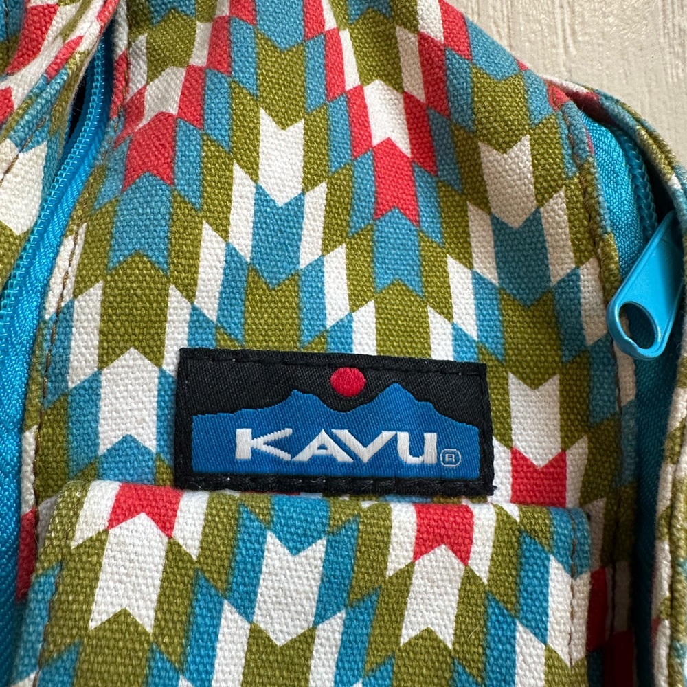Kavu, chevron design in green, blue, pink and white. Navy interior.